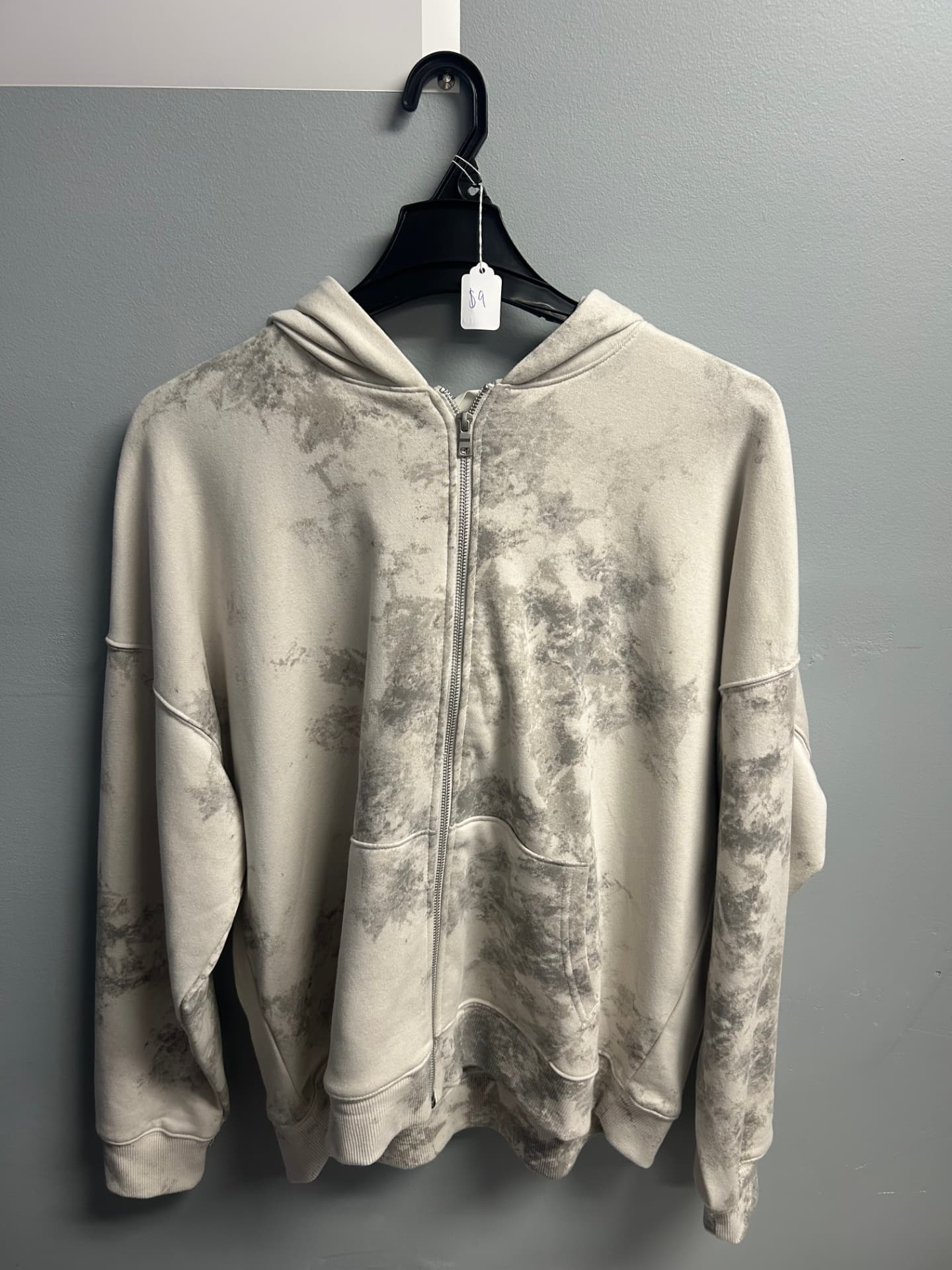 Cream tie-dye zip hoodie with hood up